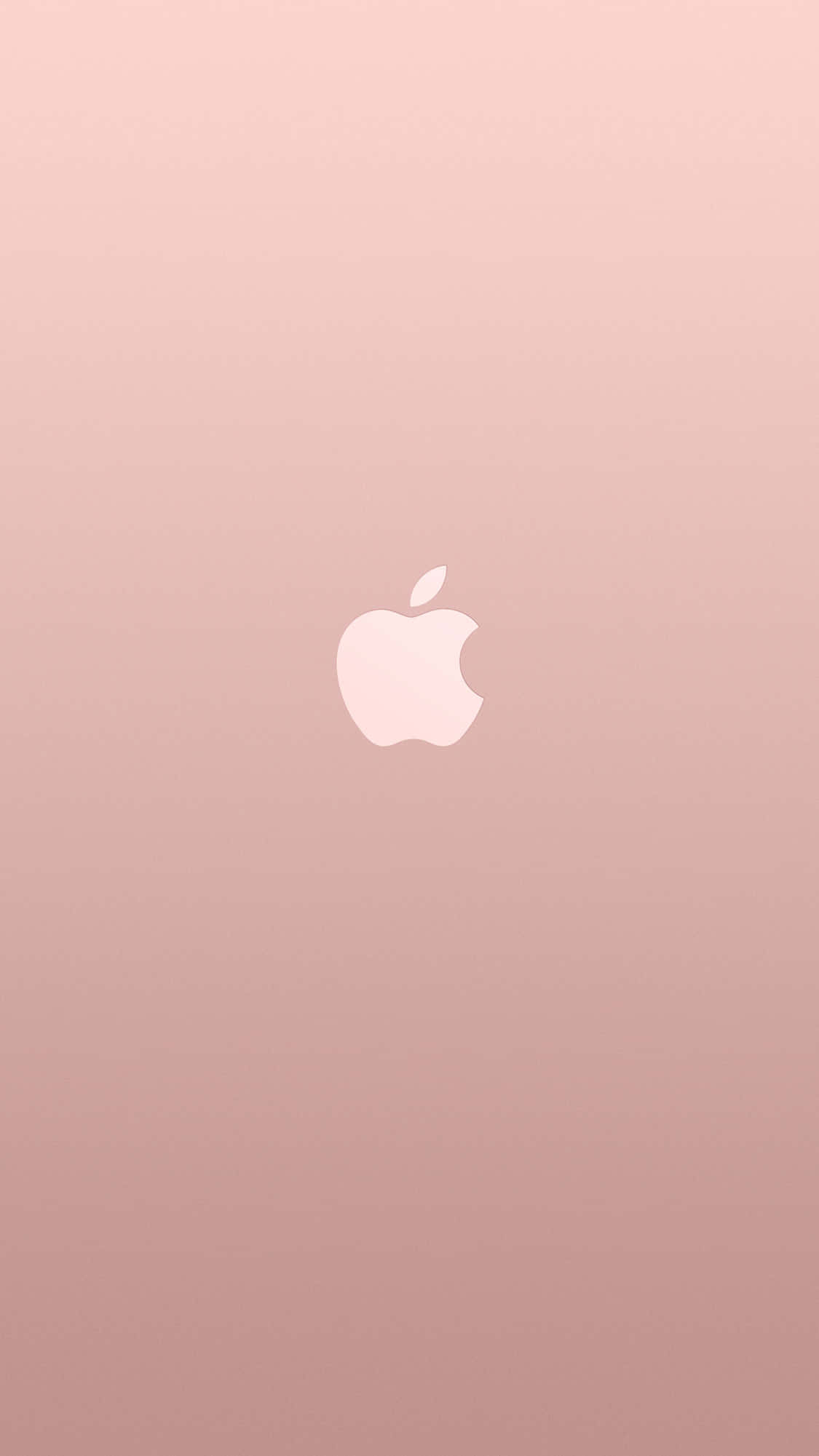 玫瑰金 iPhone 桌布 壁紙 — 一個極簡的玫瑰金漸變背景，中央有一個白色的 Apple 標誌。