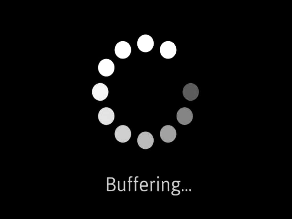 Video Buffering 桌布 壁紙 — 一個極簡的緩衝動畫，白色點點在黑色背景上顯示進度。