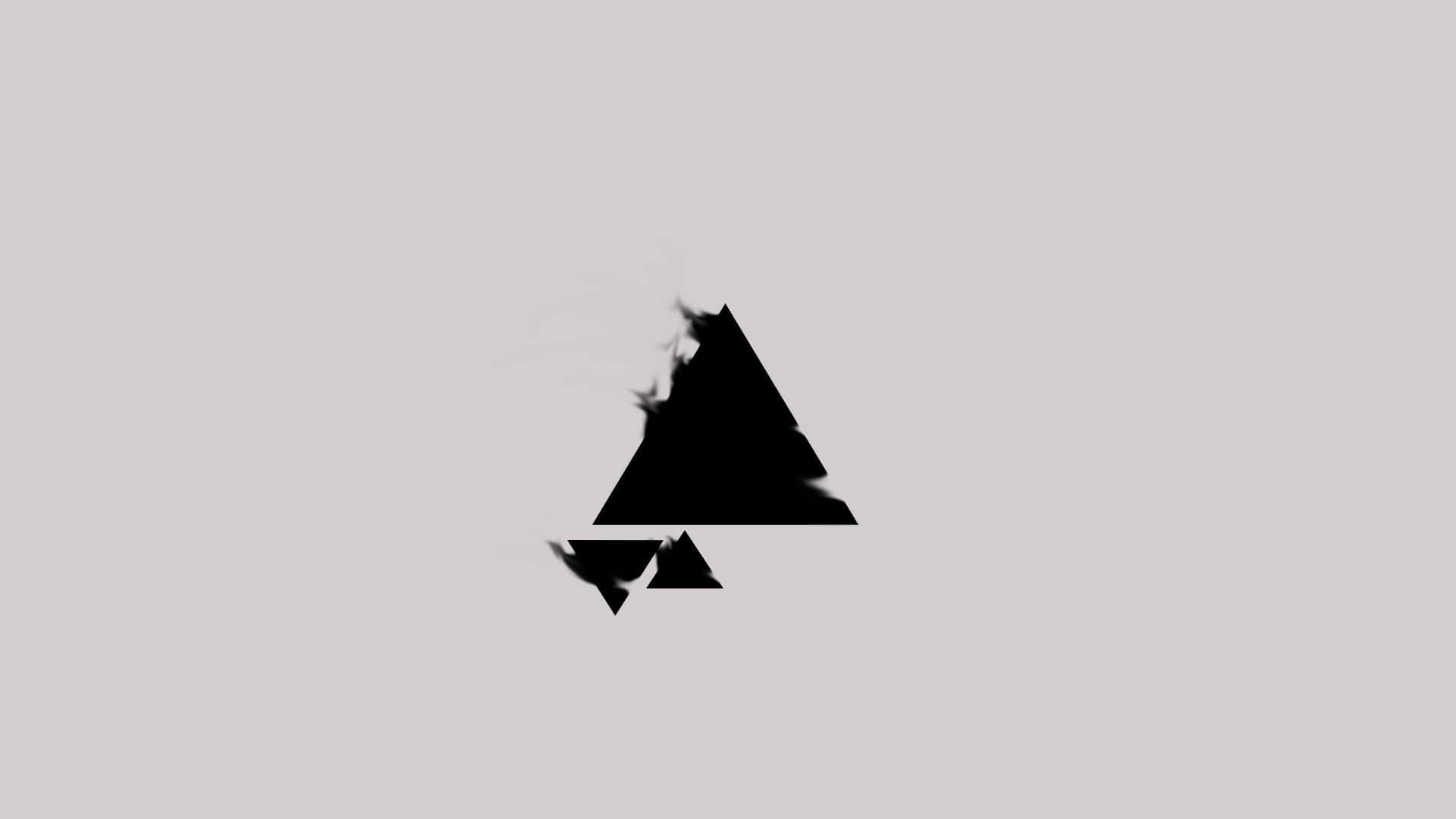 Minimalist Black And White 桌布 壁紙 — 一個極簡的黑色三角形形狀，邊緣破碎，漂浮在純淺灰色背景上。