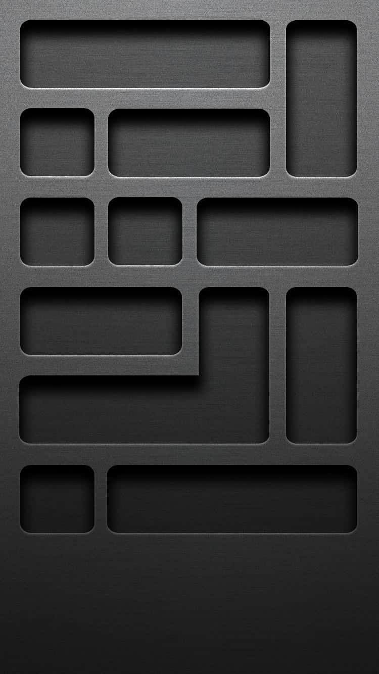 iPhone Home Screen 桌布 壁紙 — 一個極簡的黑色金屬表面，帶有凹陷的矩形面板，營造出幾何工業質感。