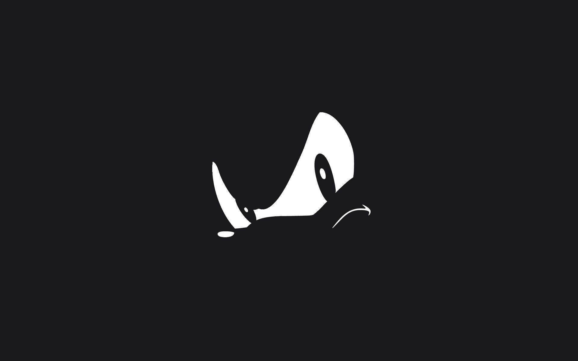 Shadow The Hedgehog 桌布 壁紙 — 一個極簡風格的白犀牛剪影，單角單眼，從黑色背景中探出。
