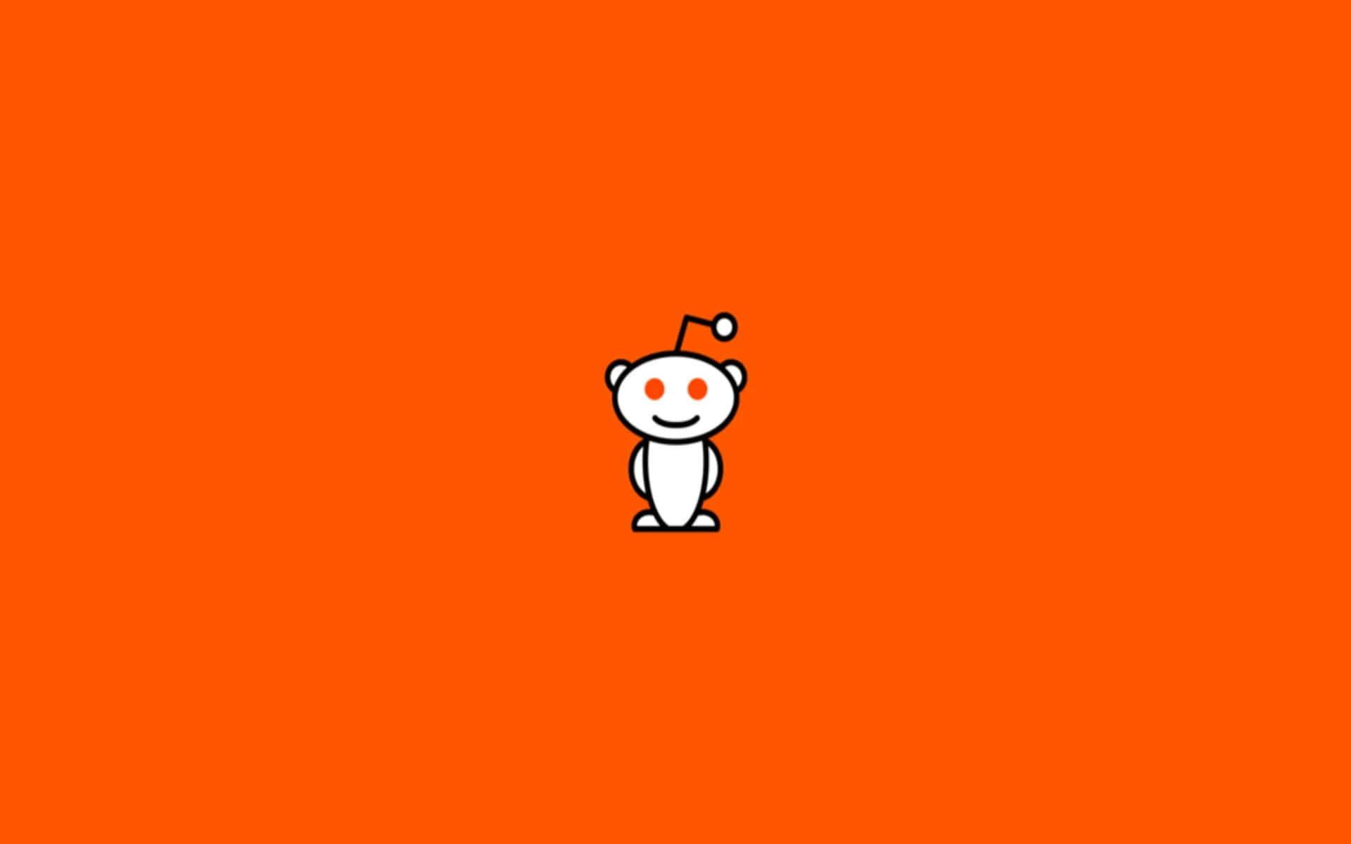 reddit 桌布 壁紙 — 一個極簡風格的白色外星人吉祥物，橙色眼睛，居中站立在純橙色背景上。