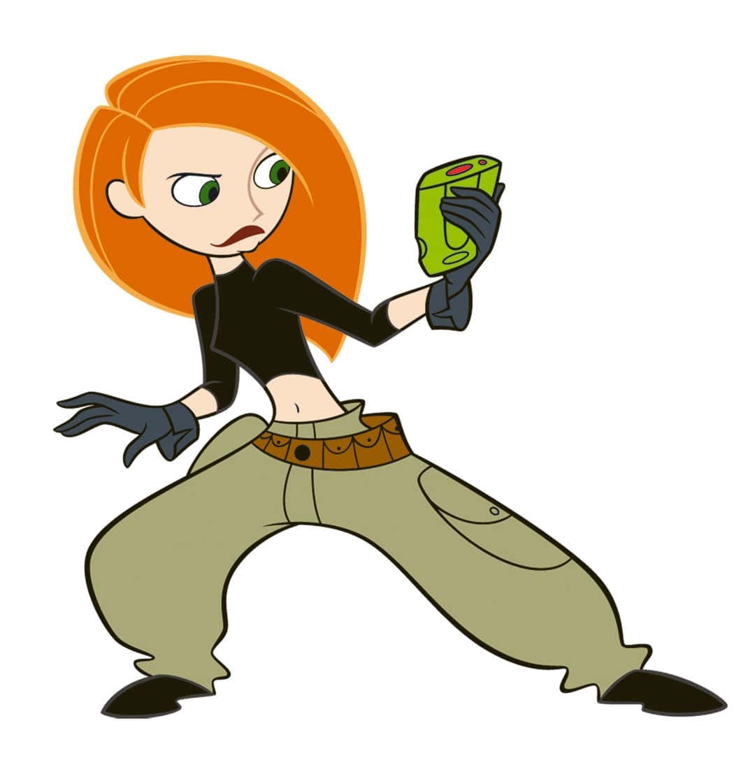 kim possible 桌布 壁紙 — 一個橙色頭髮、綠色眼睛的卡通女孩，以動態姿勢拿著一個綠色裝置。