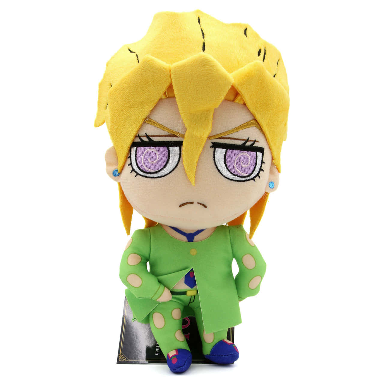 Pannacotta Fugo 桌布 壁紙 — 一個毛絨公仔，有著尖刺的黃色頭髮、紫色螺旋眼睛和綠色圓點服裝，坐在白色背景前。