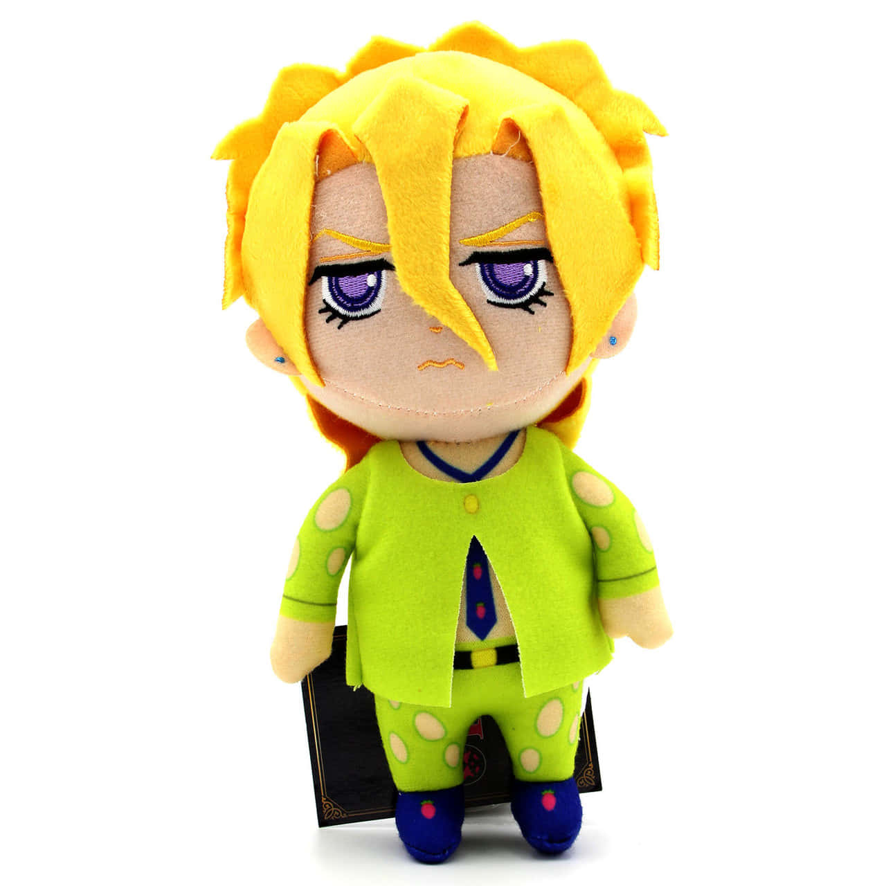 Pannacotta Fugo 桌布 壁紙 — 一個毛絨公仔，有著尖刺的黃色頭髮、紫色眼睛和綠色圓點服裝，站在白色背景前。