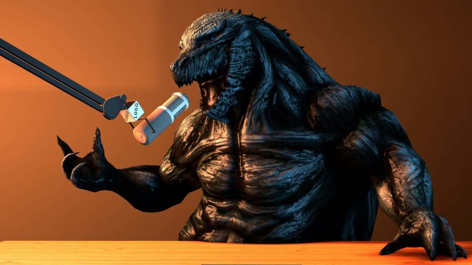 Godzilla Earth 桌布 壁紙 — 一個深色紋理的哥斯拉公仔坐在書桌前，對著咪高峰說話，背景是溫暖的橙色。