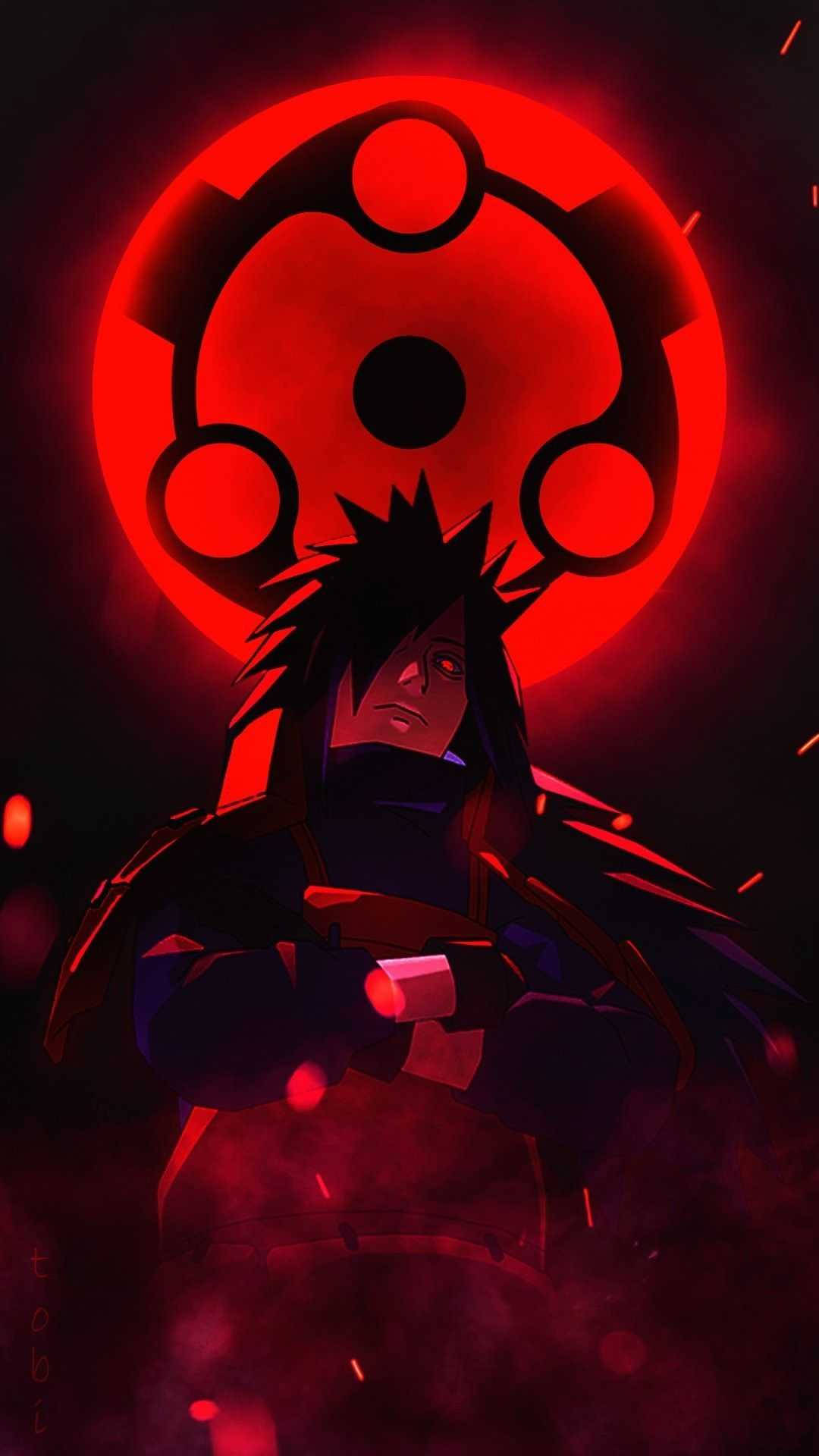 Itachi 桌布 壁紙 — 一個深色頭髮的動漫角色在煙霧般的深紅色背景下，雙臂交叉站在發光的紅色輪迴眼符號下。