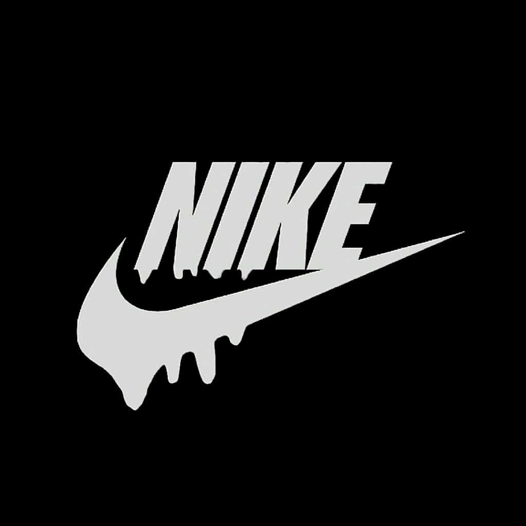 滴落效果 桌布 壁紙 — 一個滴落效果的白色Nike標誌，帶有粗體字和勾號，背景為純黑色。