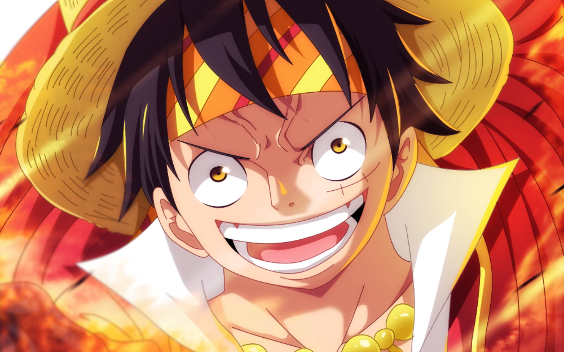 luffy smile 桌布 壁紙 — 一個火熱的動漫角色，戴著草帽，咧嘴大笑，在熾熱的橙色背景下散發出強烈的能量。