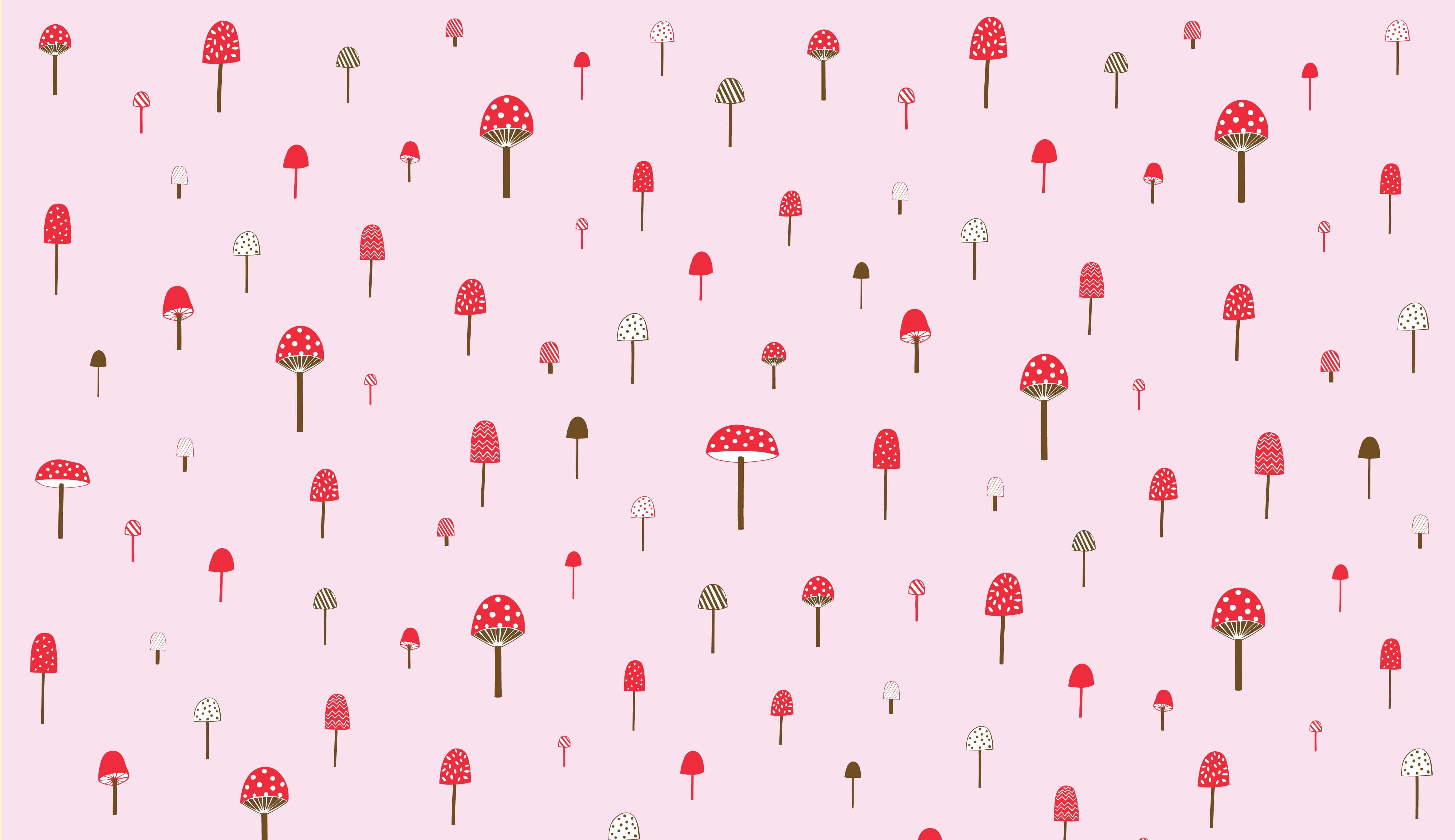 Kawaii Mushroom 桌布 壁紙 — 一個異想天開的圖案，紅色和白色斑點蘑菇散落在柔和的粉紅色背景上。
