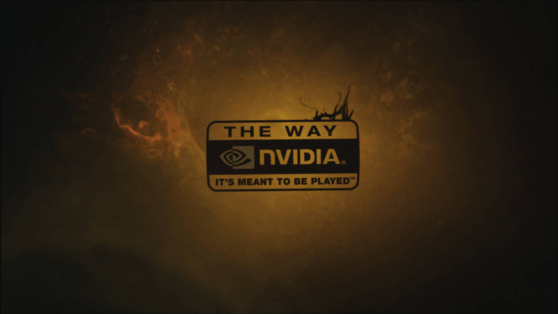 Laptop 桌布 壁紙 — 一個發光的NVIDIA標誌，帶有'THE WAY'和'IT'S MEANT TO BE PLAYED'文字，背景是火熱的橙色和黑色宇宙背景。