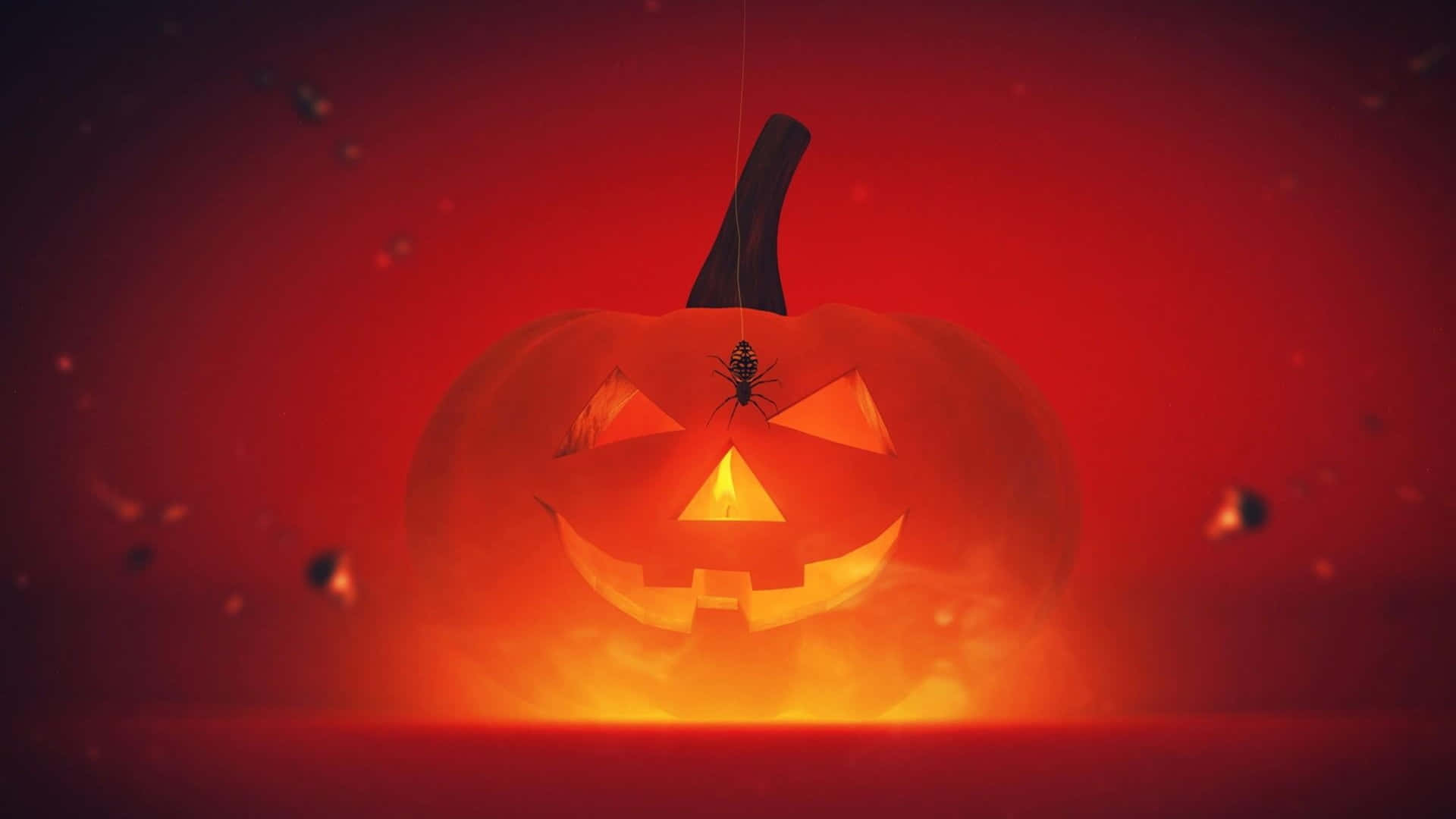3d Halloween 桌布 壁紙 — 一個發光的南瓜，臉上有一隻蜘蛛，掛在深紅色背景上，有漂浮的粒子。