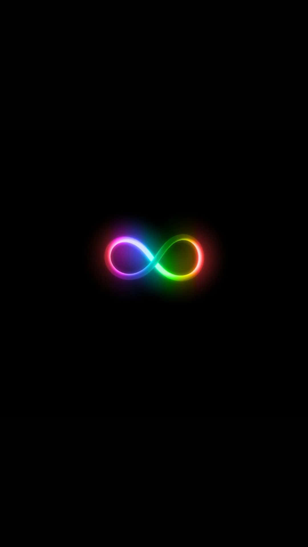Dark Infinity 桌布 壁紙 — 一個發光的彩虹無限符號在純黑色背景上柔和地脈動。