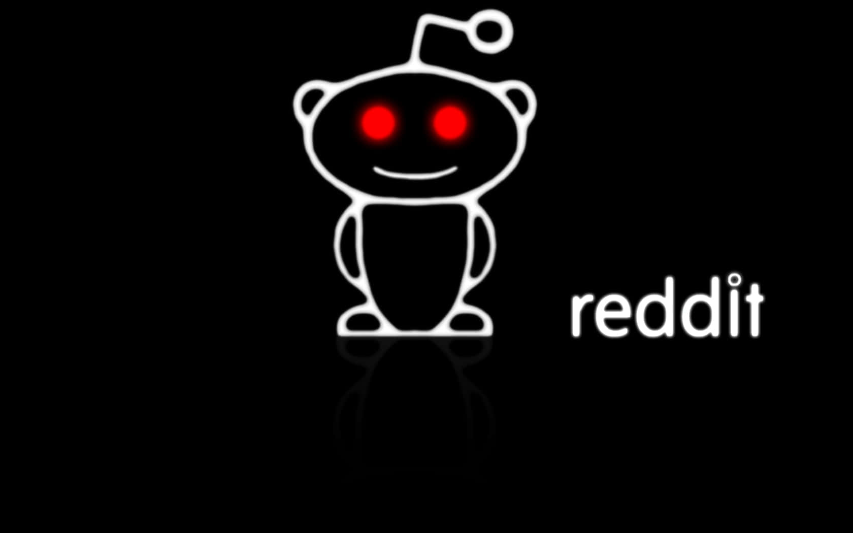 reddit 桌布 壁紙 — 一個發光的白色 Reddit 外星人吉祥物，紅色眼睛，站在黑色背景前，帶有微妙的倒影。