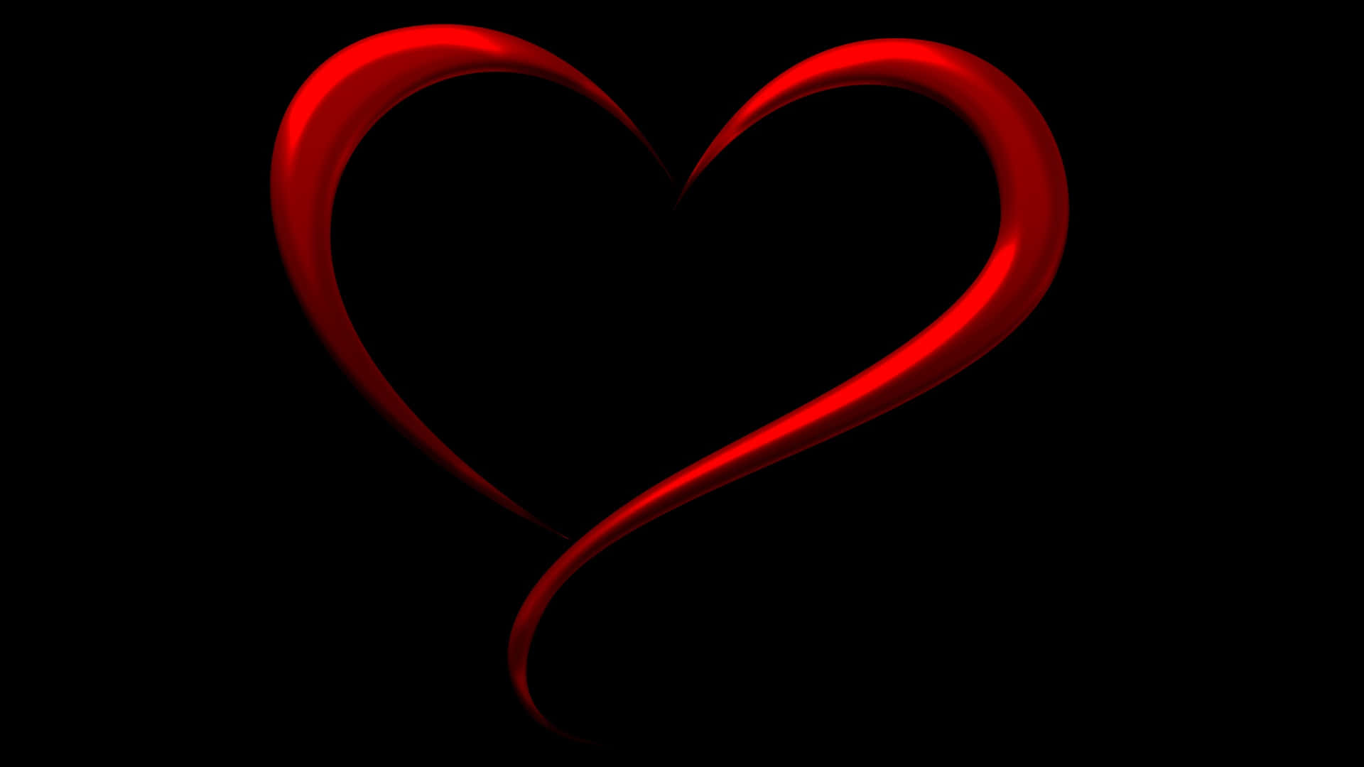 Red Heart 桌布 壁紙 — 一個發光的紅色心形絲帶漂浮在純黑色背景上，帶有柔和的高光。