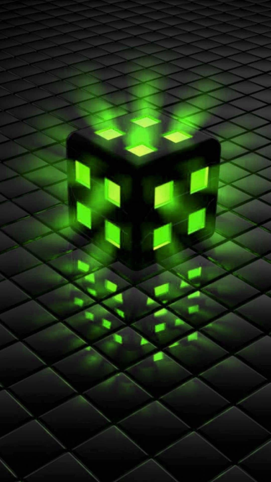 3D 桌布 壁紙 — 一個發光的綠色立方體，帶有發光的方格，放置在深色瓷磚地板上，投射出鮮豔的倒影。
