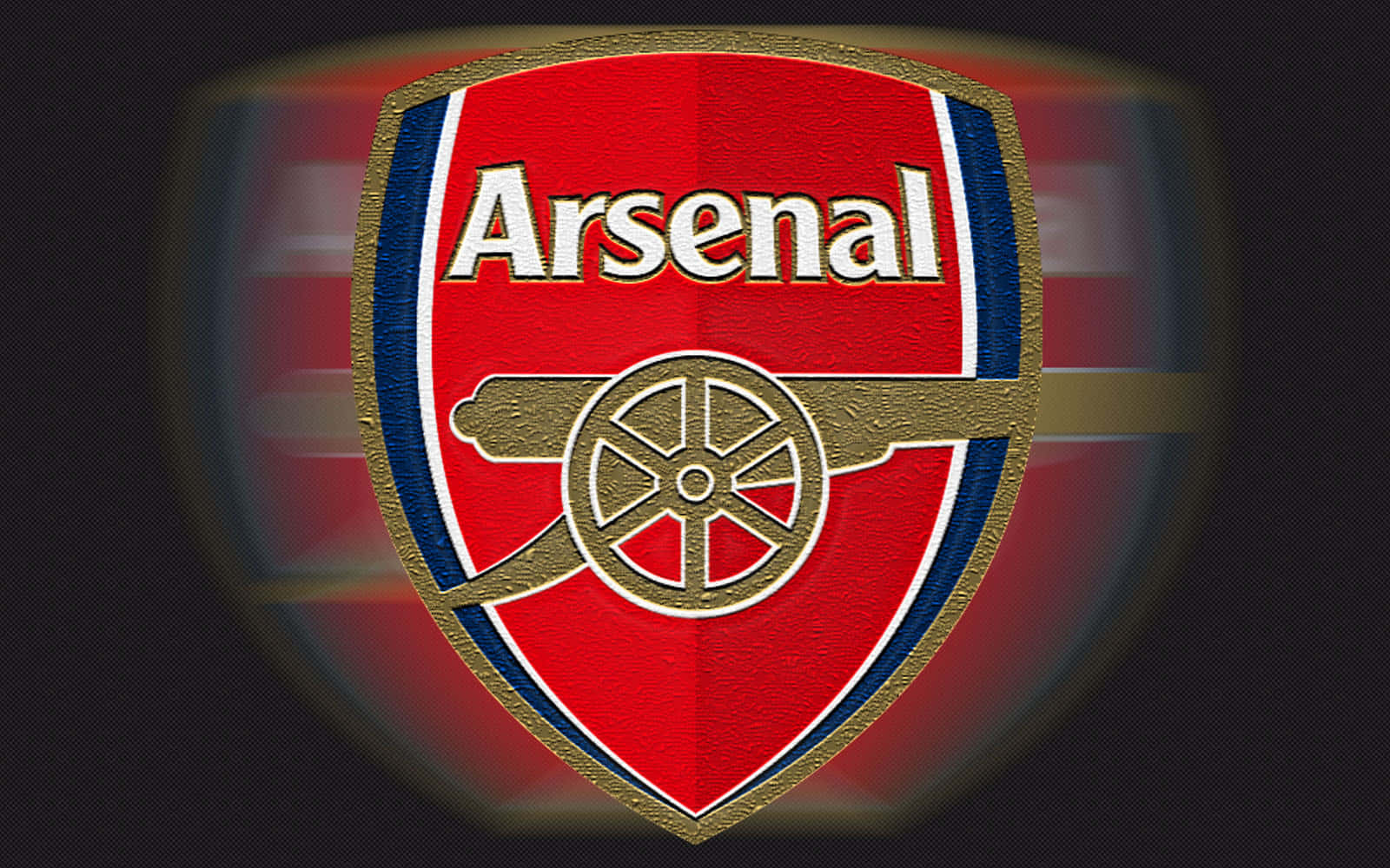 Arsenal 桌布 壁紙 — 一個發光的阿仙奴足球會徽章，紅色盾牌中央有金色大炮，背景深色。