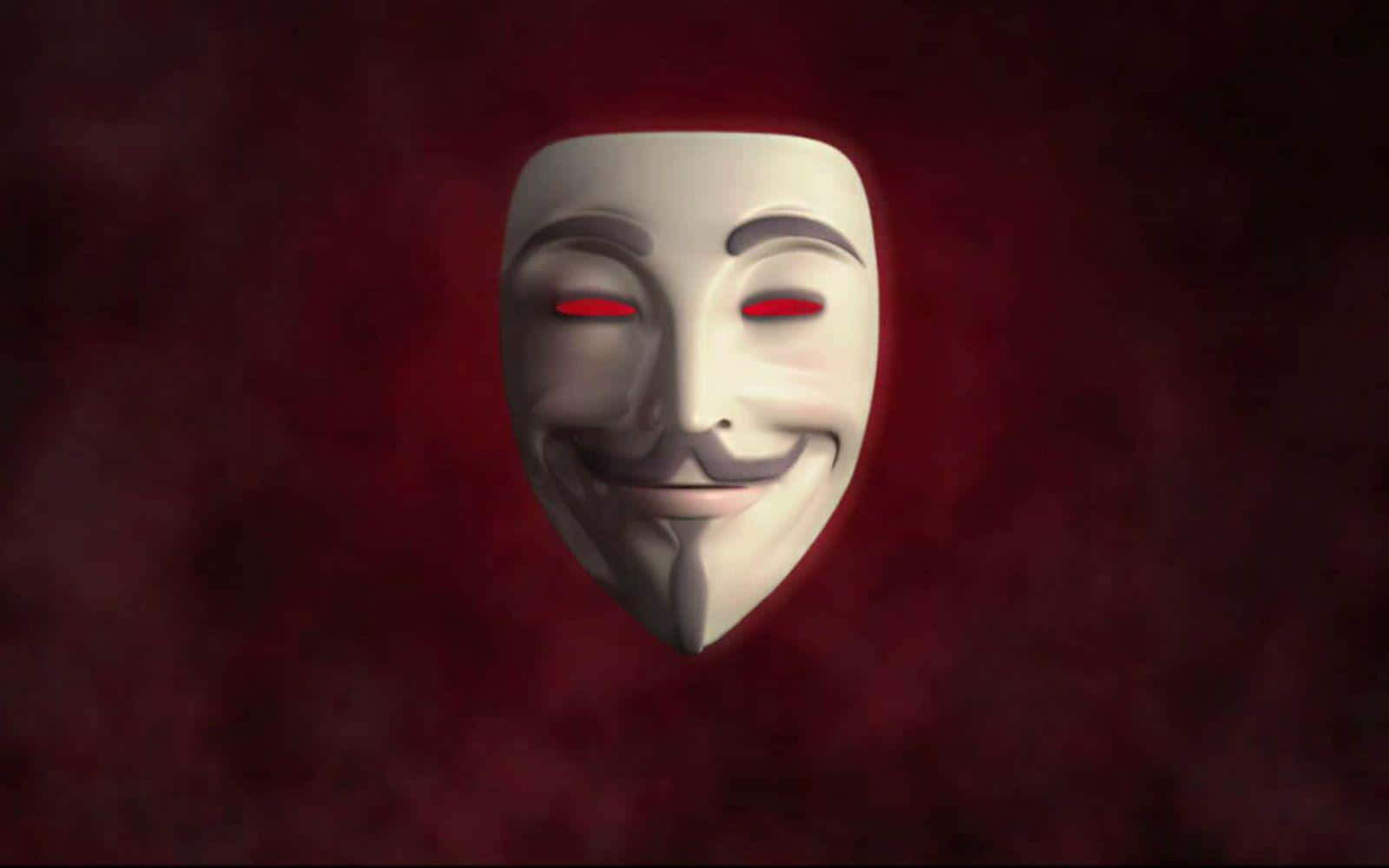 Anonymous 桌布 壁紙 — 一個白色 Guy Fawkes 面具，帶有發光的紅色眼睛，漂浮在深色煙霧般的棗紅色背景上。