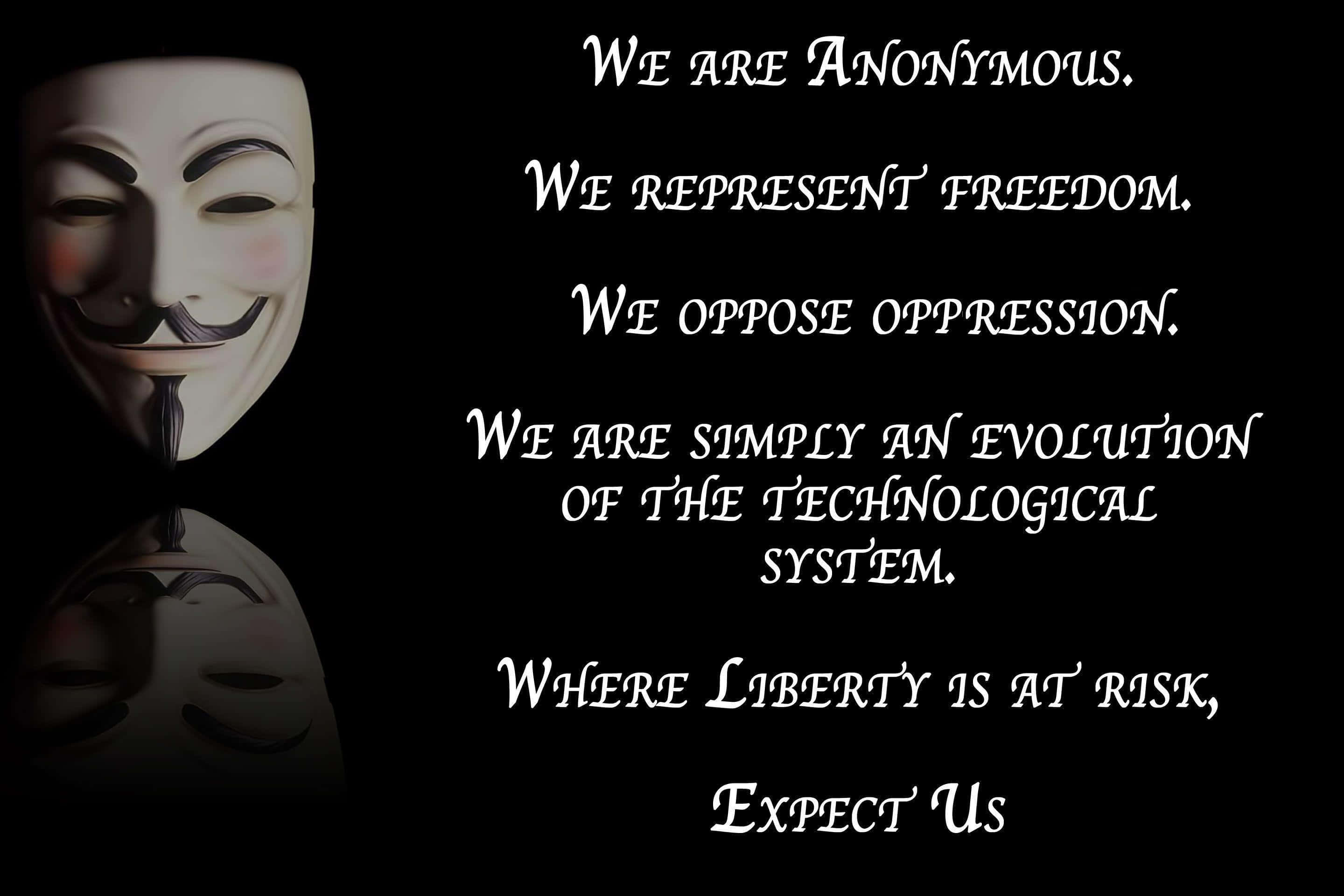 Anonymous 桌布 壁紙 — 一個白色 Guy Fawkes 面具，上面有文字宣示匿名、自由和反對壓迫，背景為黑色。