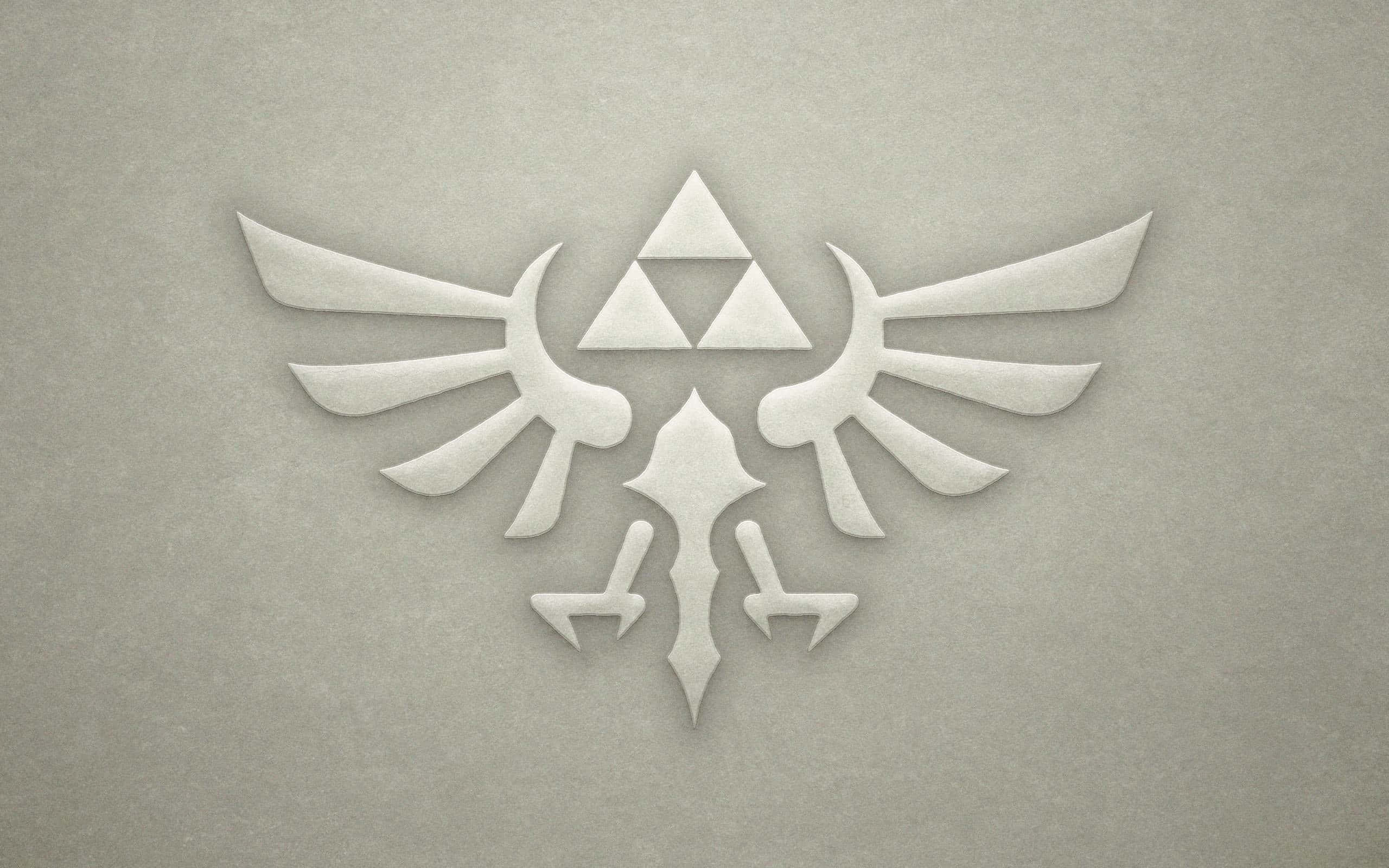 The Legend Of Zelda Hyrule 桌布 壁紙 — 一個白色 Triforce 標誌，帶有翼狀手臂和爪狀腳，壓印在紋理灰色表面上。
