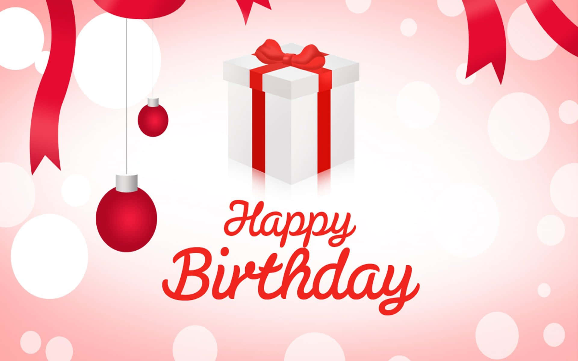 Birthday Wishes 桌布 壁紙 — 一個白色禮物盒，配有紅色絲帶和懸掛裝飾，背景是粉紅色散景，並帶有 'Happy Birthday' 文字。