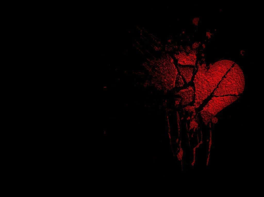 Broken Heart Black 桌布 壁紙 — 一個破裂的紅色心形，在黑色背景上濺有深紅色油漆。