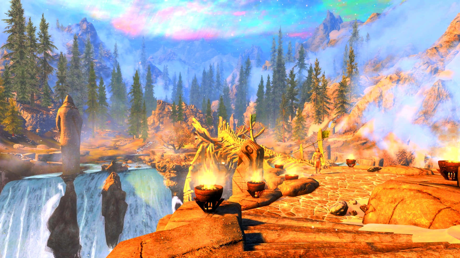 Sovngarde 桌布 壁紙 — 一個神秘的山谷，有層疊的瀑布、古老的石像和發光的火坑，在充滿活力的暮色天空下。