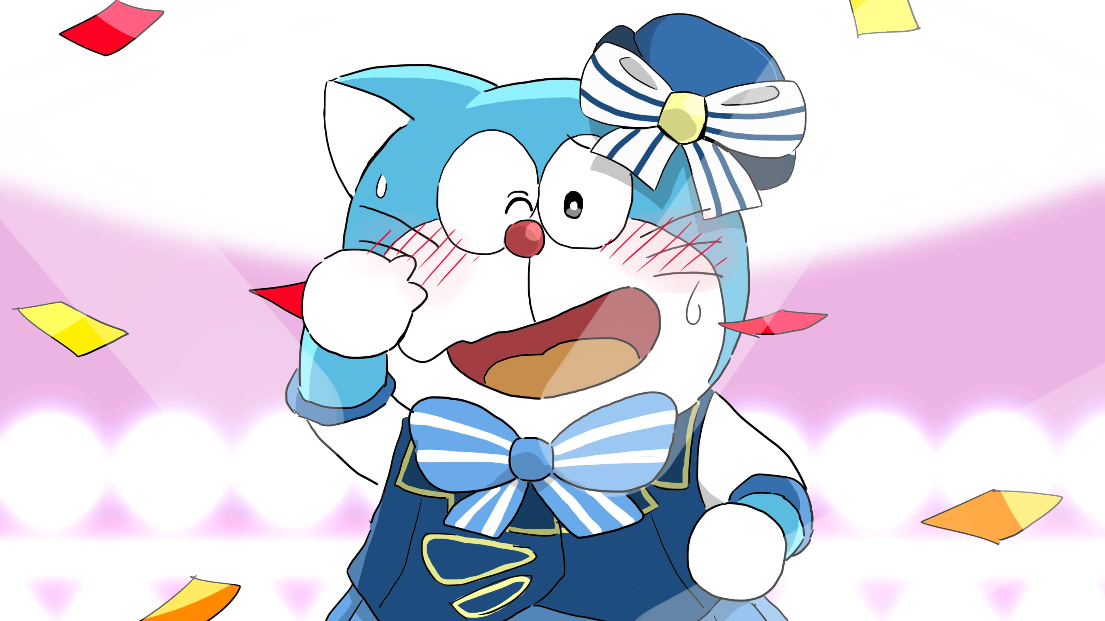 Doraemon 桌布 壁紙 — 一個穿著水手服的開心藍色貓型機械人，周圍有五彩紙屑飛舞，露出燦爛的笑容。