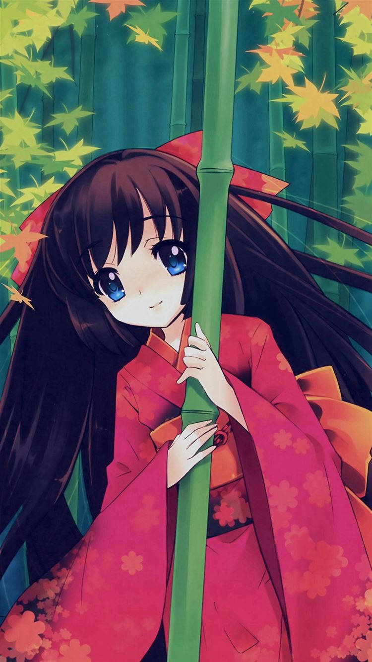  壁紙 — 一個穿著紅色和服的開朗動漫女孩，在充滿活力的綠色和橙色楓葉中手持竹枝。