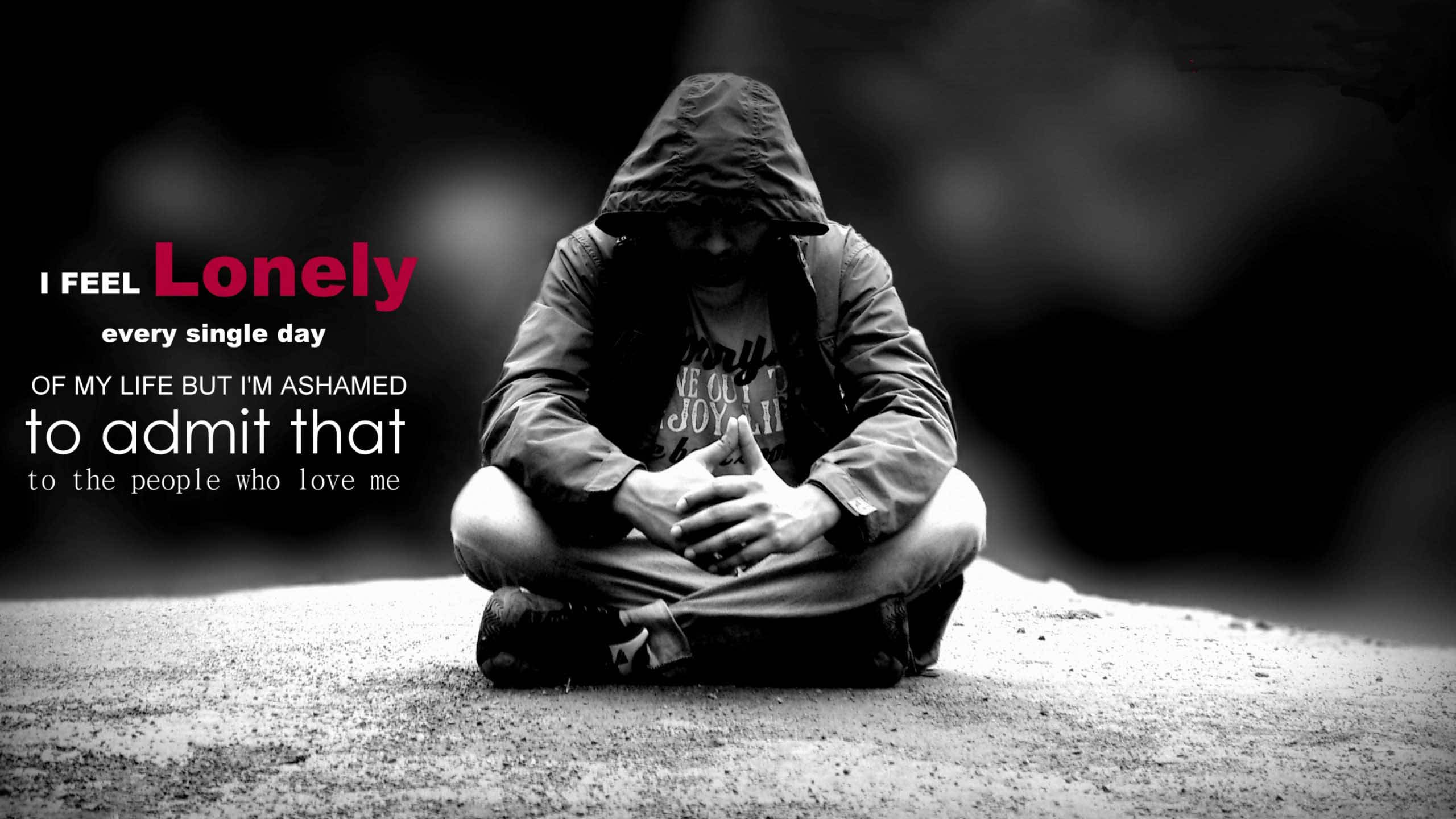 emo 桌布 壁紙 — 一個穿著連帽外套的人獨自坐在行人路上，帶有表達孤獨和羞恥的文字疊加。