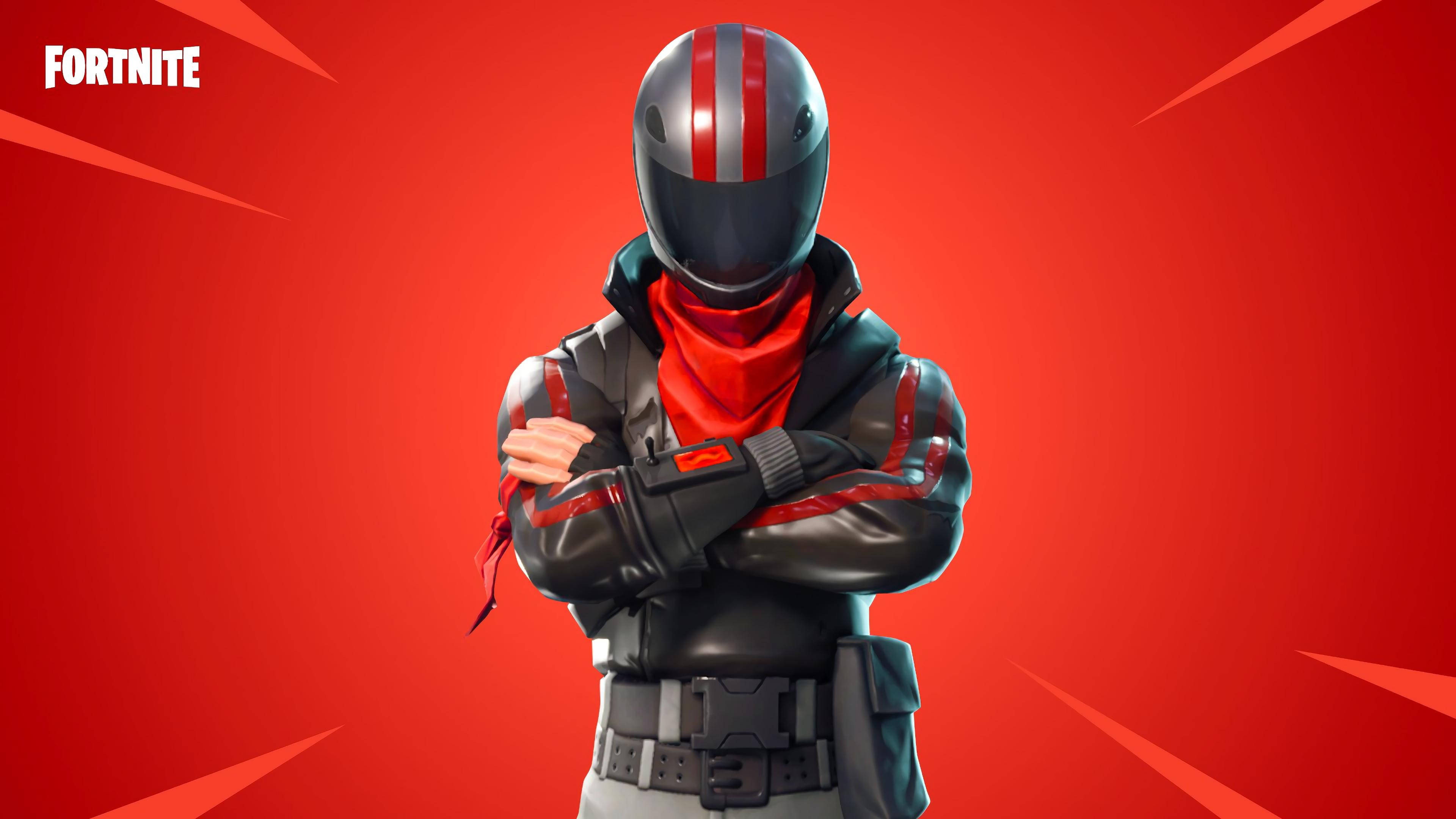 遊戲 桌布 壁紙 — 一個穿著黑色和紅色裝備的Fortnite角色，在充滿動感對角線的鮮紅色背景前自信地交叉雙臂站立。
