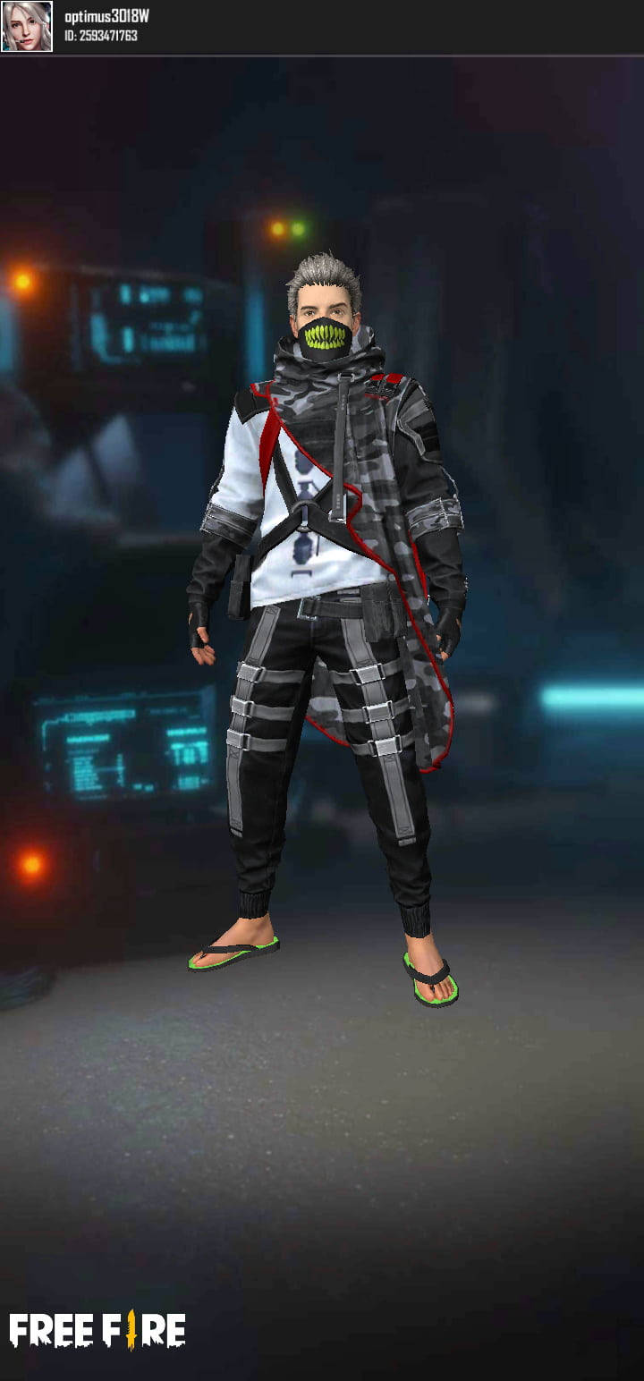 dj alok free fire 桌布 壁紙 — 一個穿著黑色戰術服裝、戴著發光綠色面具的賽博朋克角色，站在昏暗的未來場景中。
