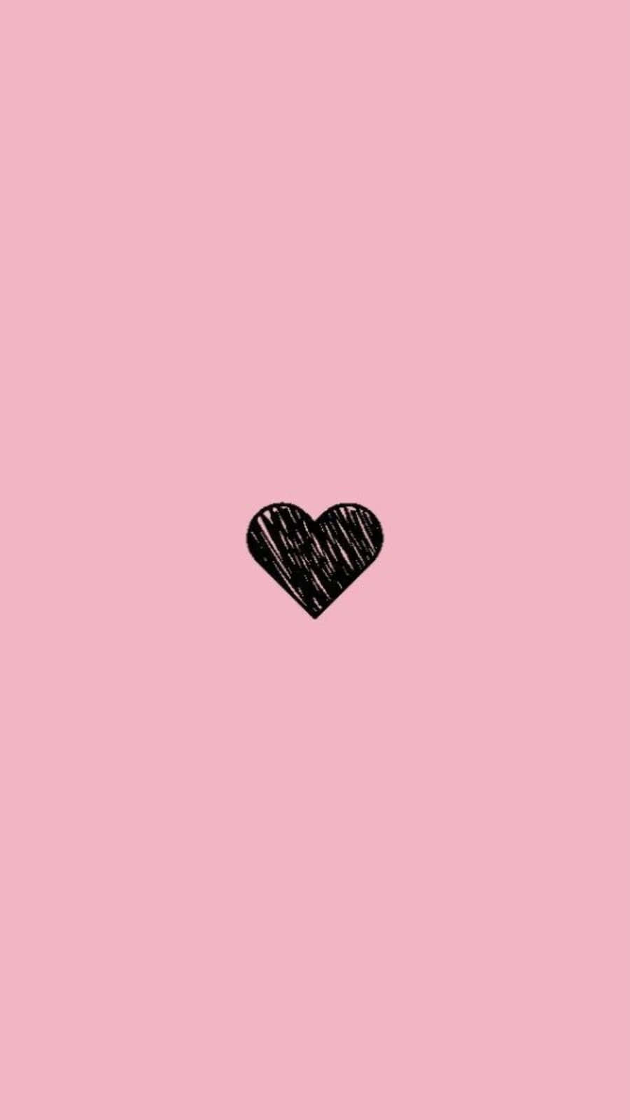 Heart Shape 桌布 壁紙 — 一個簡單的黑色塗鴉心形，置於柔和的粉紅色背景中央。