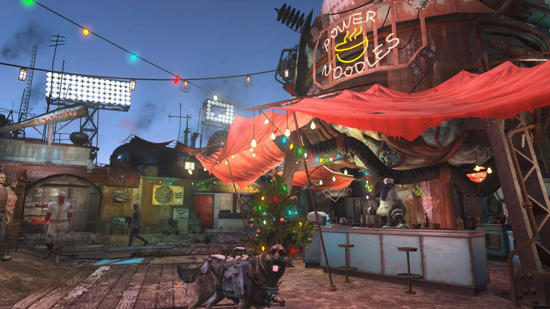 Diamond City 桌布 壁紙 — 一個粗糙的後末日風格餐廳，帶有紅色遮篷、串燈和一個在暮色天空下寫著 power noodles 的霓虹燈招牌。