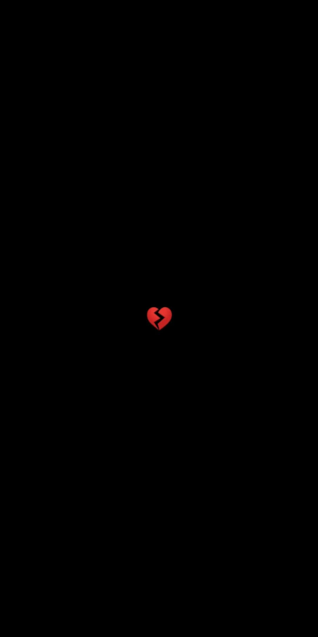 Broken Heart Black 桌布 壁紙 — 一個紅色破碎心形圖示，置中於純黑色背景上。