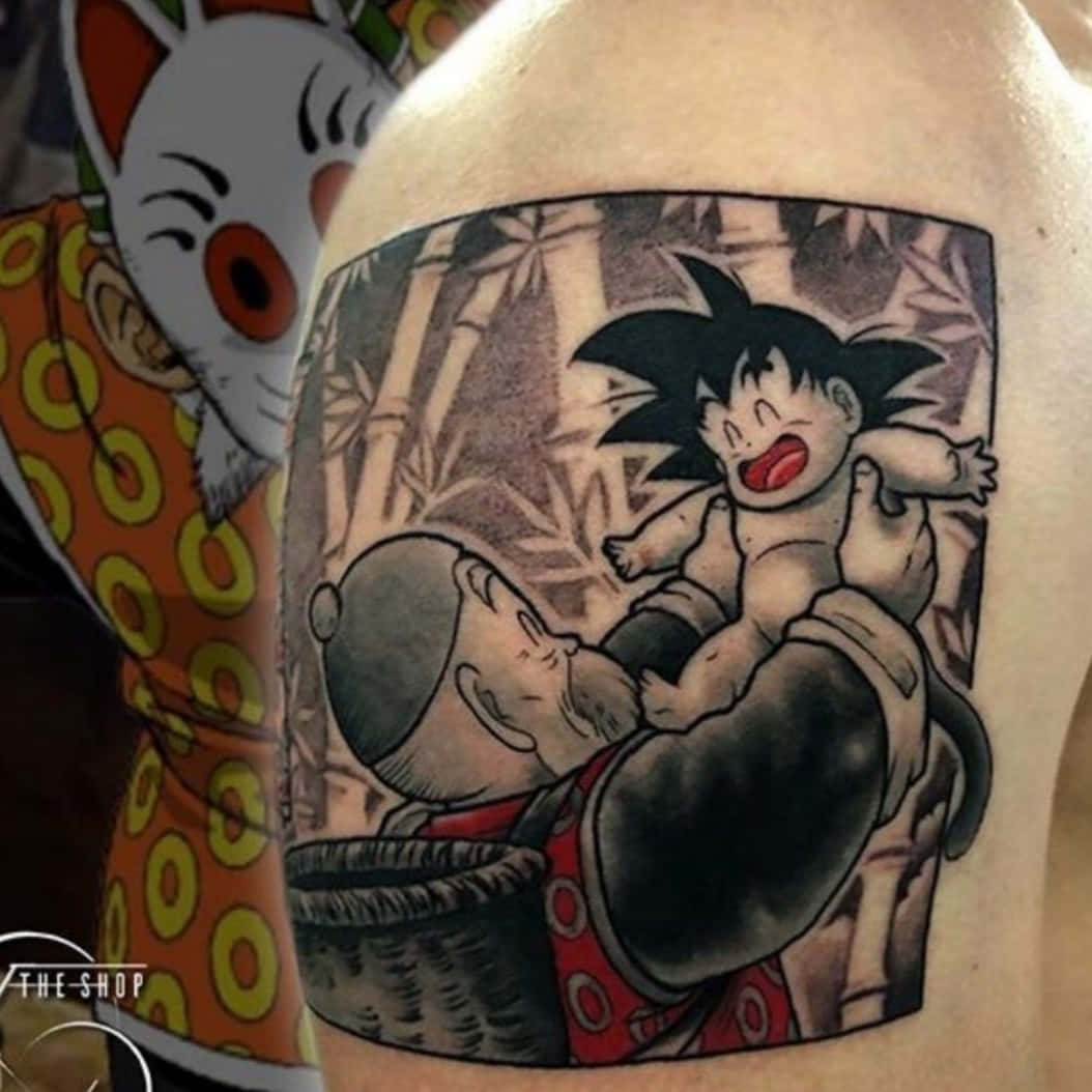 Grandpa Gohan 桌布 壁紙 — 一個紋身描繪了快樂的嬰兒悟空被悟飯爺爺抱在竹林場景中。