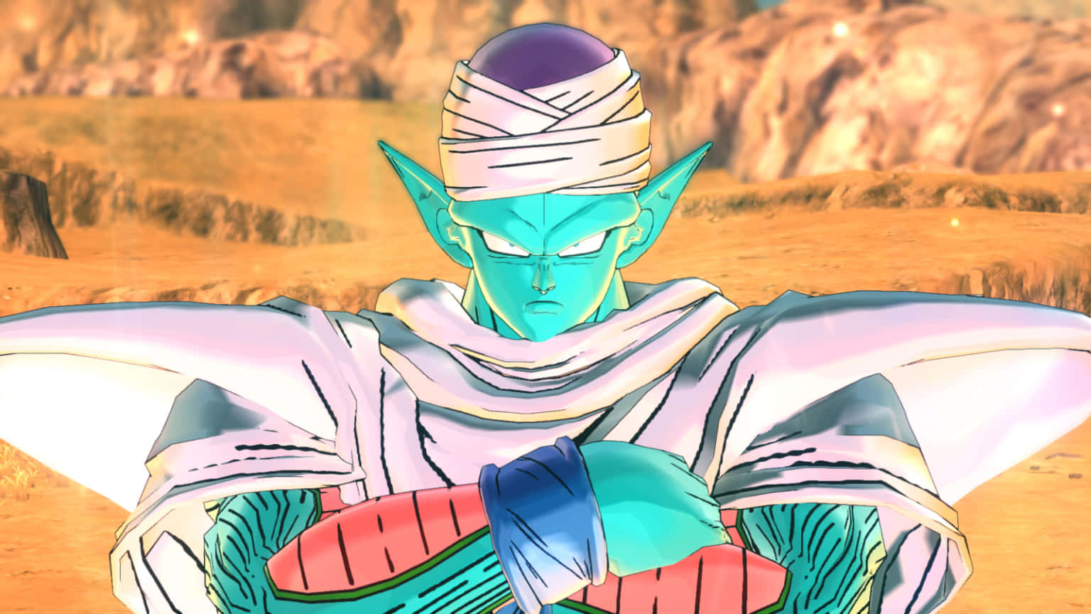 Namek 桌布 壁紙 — 一個綠色皮膚的動漫角色，頭部纏著繃帶，耳朵尖尖，雙臂交叉站在沙漠景觀中。