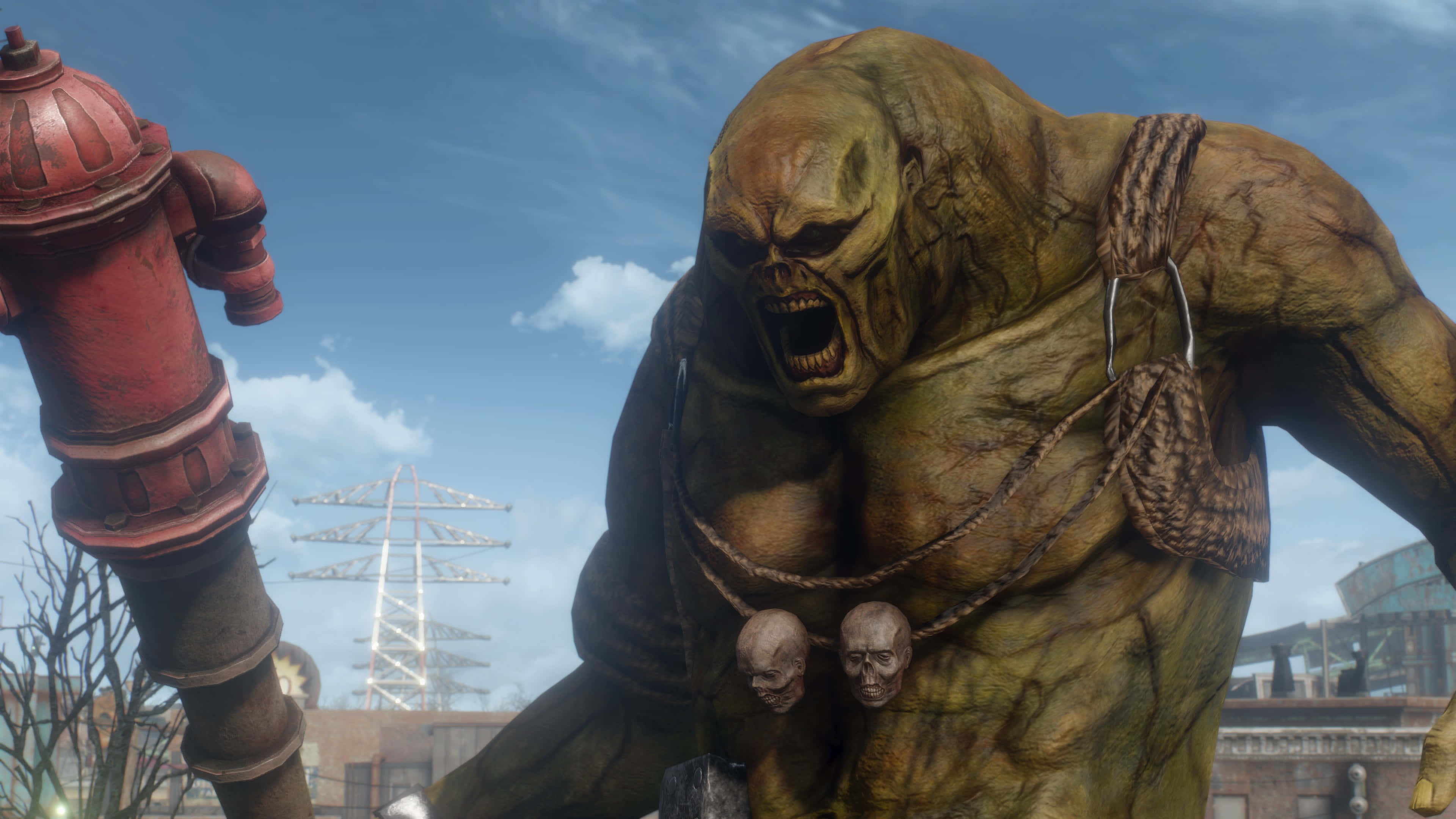 Fallout 4 The Capital Wasteland 桌布 壁紙 — 一個綠色皮膚的怪物，脖子上掛著骷髏頭，在廢墟城市街道上生鏽的消防栓旁咆哮。