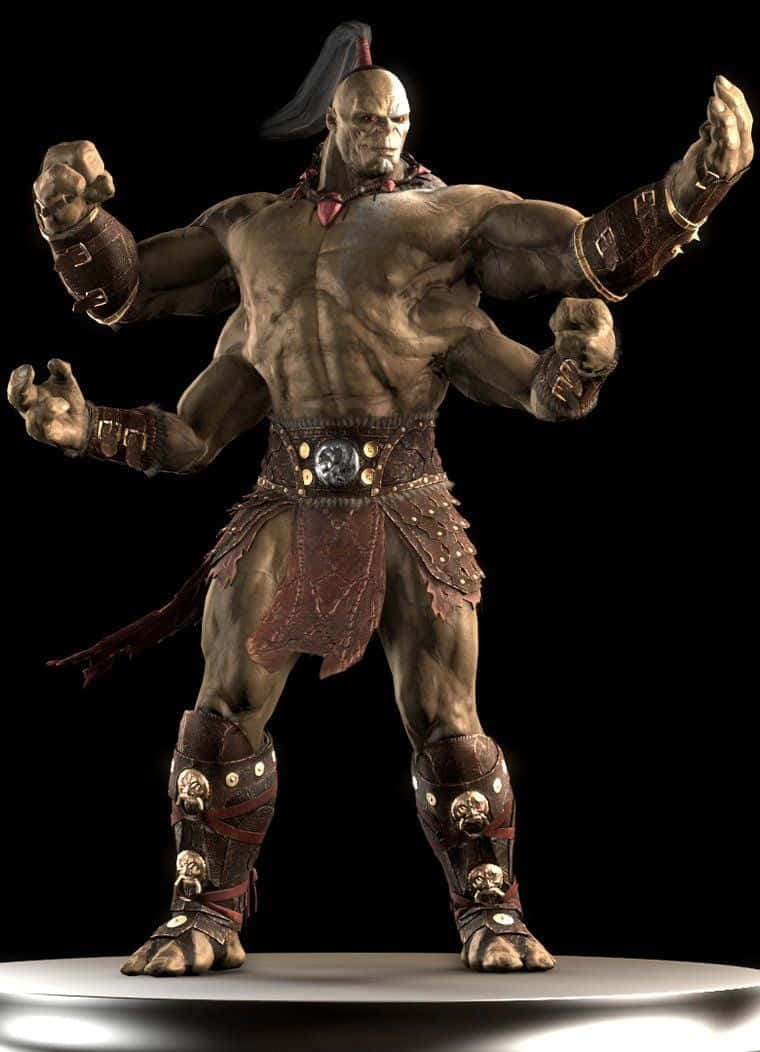 Mortal Kombat Goro 桌布 壁紙 — 一個肌肉發達的四臂戰士，有著骷髏般的臉龐和部落盔甲，在黑色背景下強勢站立。
