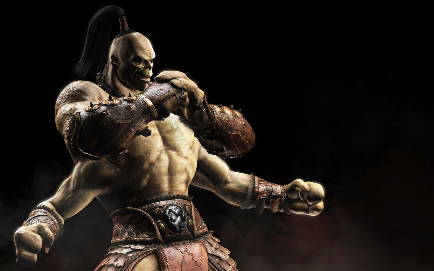 Mortal Kombat Goro 桌布 壁紙 — 一個肌肉發達的戰士，有著骷髏般的面孔和尖刺盔甲，在黑暗煙霧彌漫的環境中向前猛衝。
