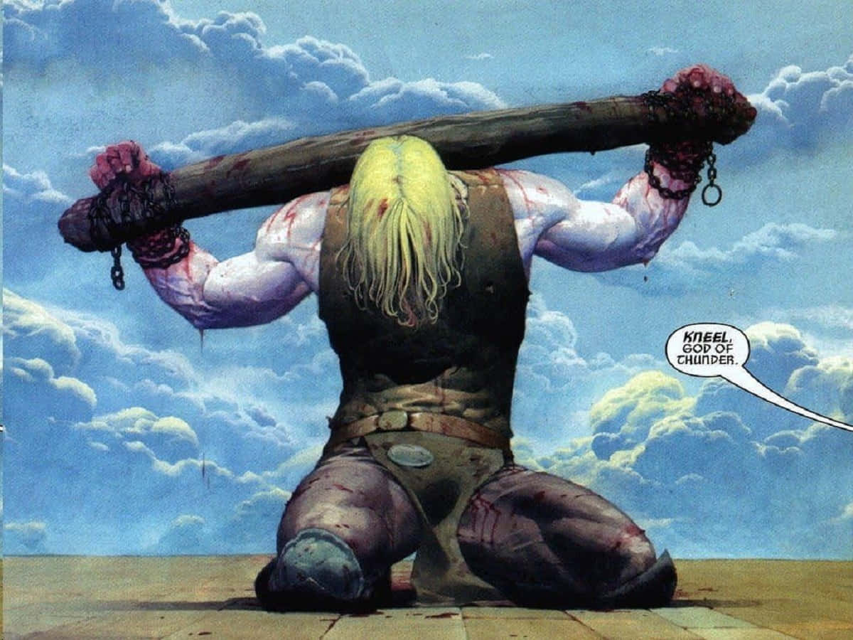 God Of Thunder 桌布 壁紙 — 一個肌肉發達的金髮戰士跪在血淋淋的木頭下，木頭用鏈條鎖在他的手腕上，背景是陰天。