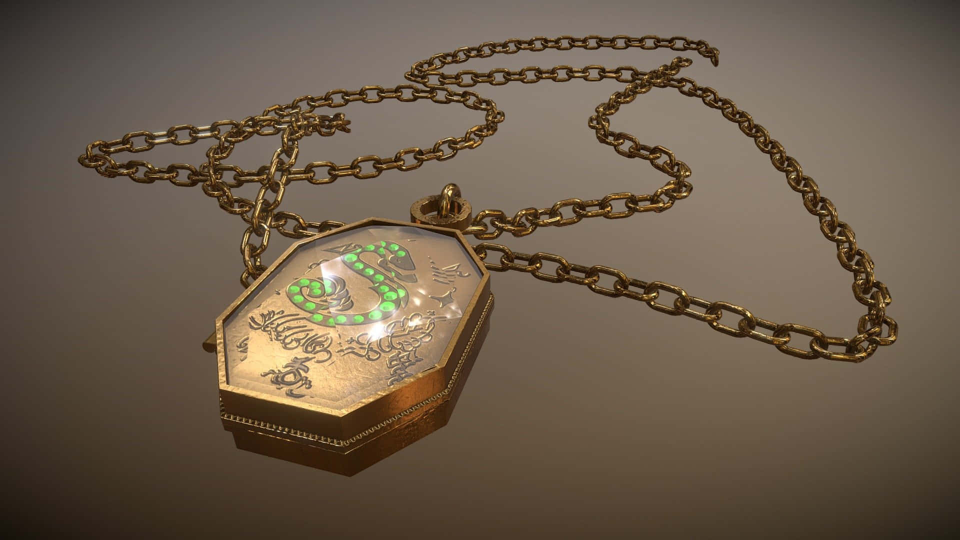 Horcrux 桌布 壁紙 — 一個華麗的金色吊墜，帶有發光的綠色蛇形設計，放在相配的鏈條上，背景是柔和的灰色。