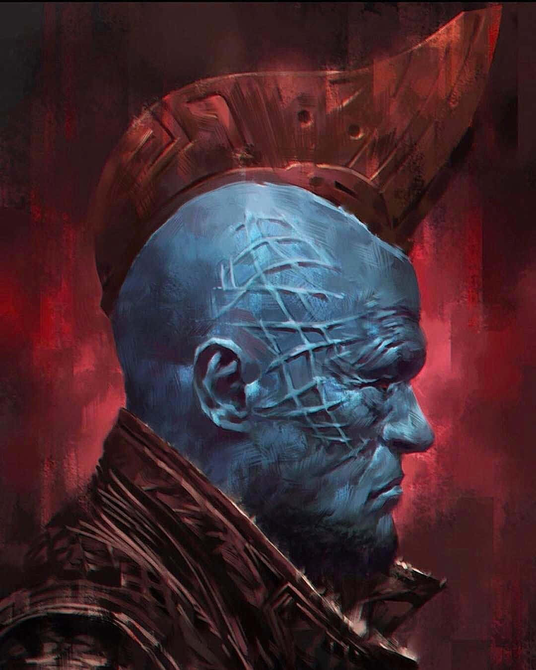 Yondu 桌布 壁紙 — 一個藍皮膚的戰士，戴著尖刺頭盔和臉部紋身，在血紅色背景下側面凝視。