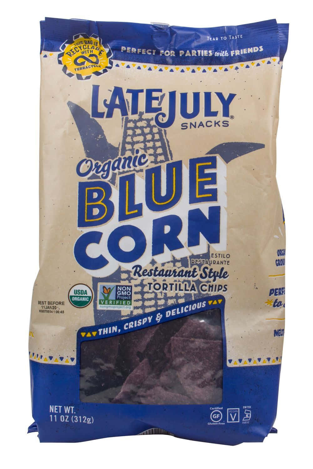 Blue Chips 桌布 壁紙 — 一個藍色和米色的Late July Organic Blue Corn Tortilla Chips袋，帶有透明窗口顯示內部的薯片。
