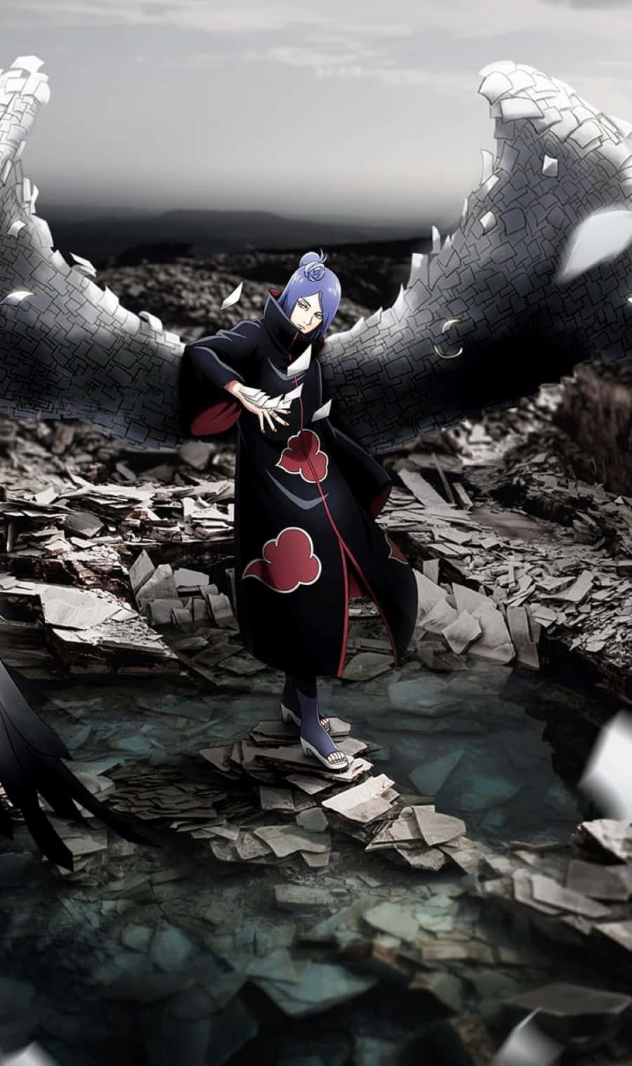 Akatsuki Poster 桌布 壁紙 — 一個藍色頭髮的動漫角色，身穿帶有紅色雲紋的黑色斗篷，站在破碎的石翼和裂開的地面之間。