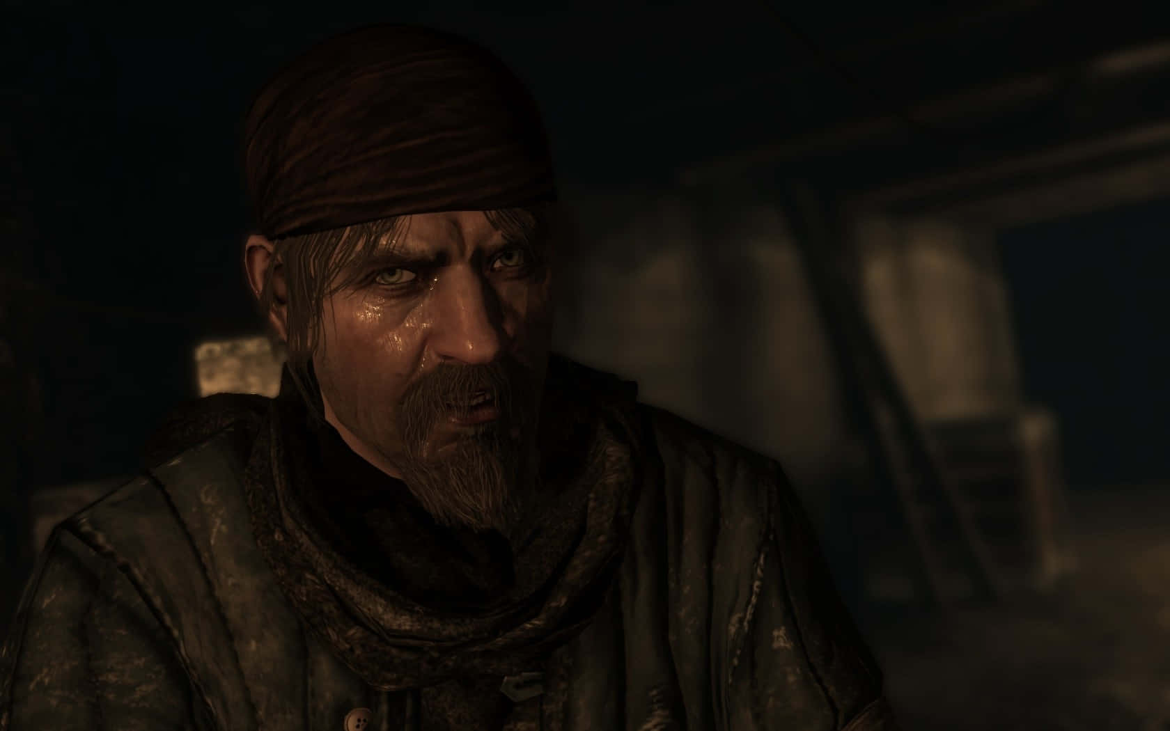 Viktor Reznov 桌布 壁紙 — 一個表情嚴峻、戴著頭巾和鬍鬚的男人，在昏暗骯髒的室內環境中凝視著。