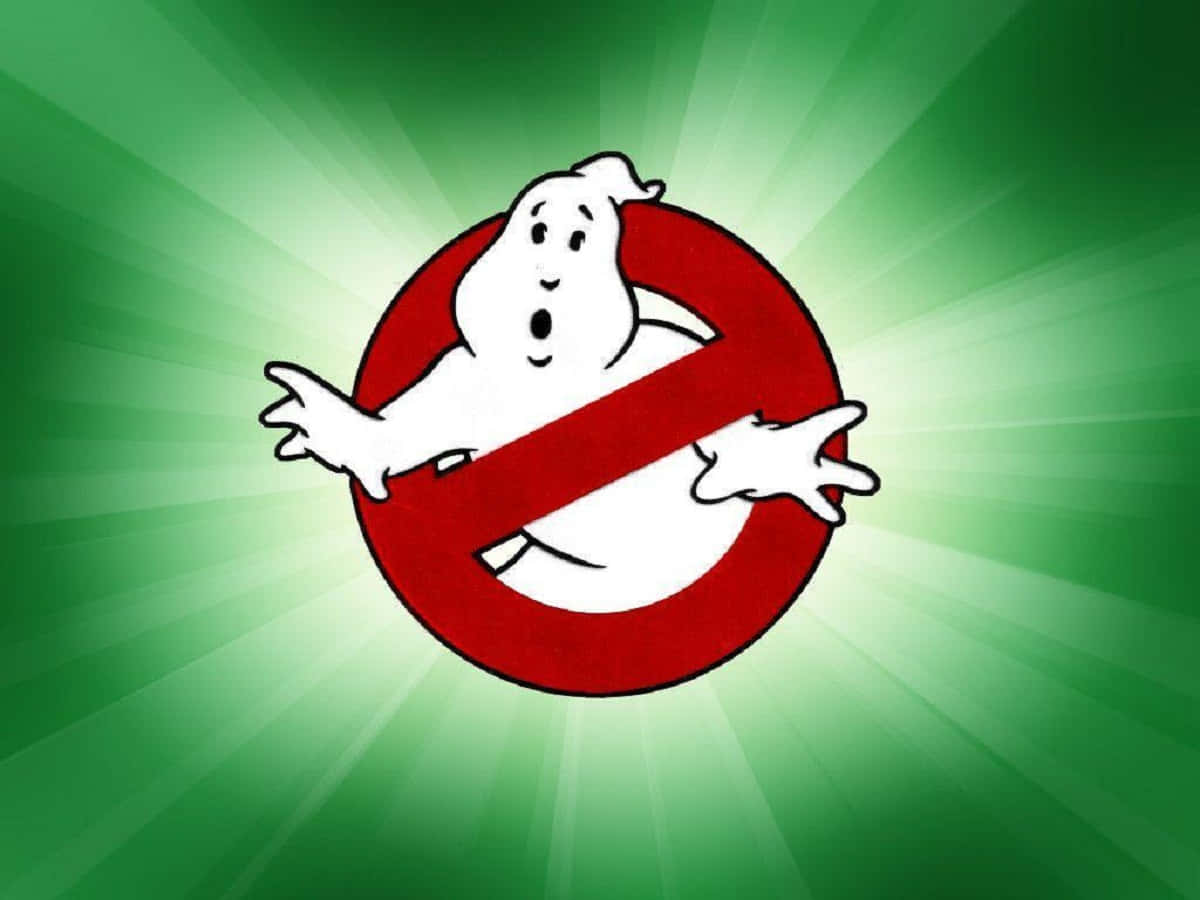Ghostbusters 桌布 壁紙 — 一個表情驚訝的卡通鬼魂被困在紅色禁止標誌內，背景是充滿活力的綠色放射狀背景。