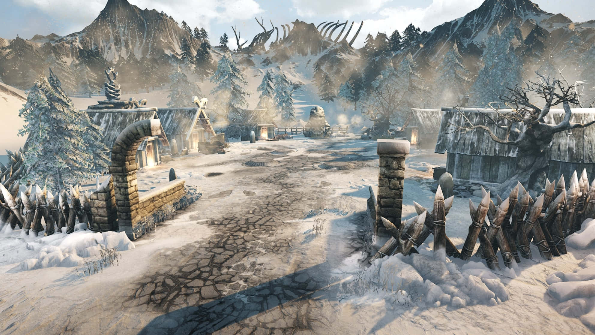 Heljarchen Hall 桌布 壁紙 — 一個被雪覆蓋的中世紀村莊大門，通往一個坐落在高聳山峰下、天空多雲的冰凍聚落。