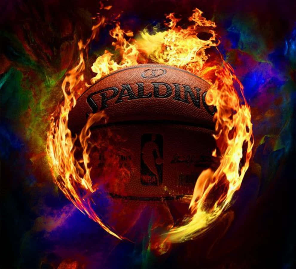 Cool Basketball 桌布 壁紙 — 一個被鮮豔火焰吞噬的Spalding籃球，背景是旋轉的多彩宇宙。
