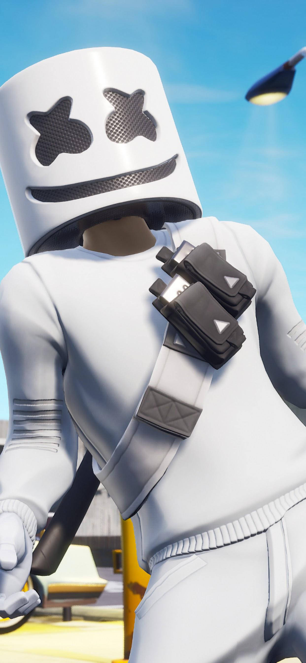 Marshmello iPhone 壁紙 — 一個角色戴著白色棉花糖頭盔，有星星眼睛和微笑，站在明亮的戶外環境中。